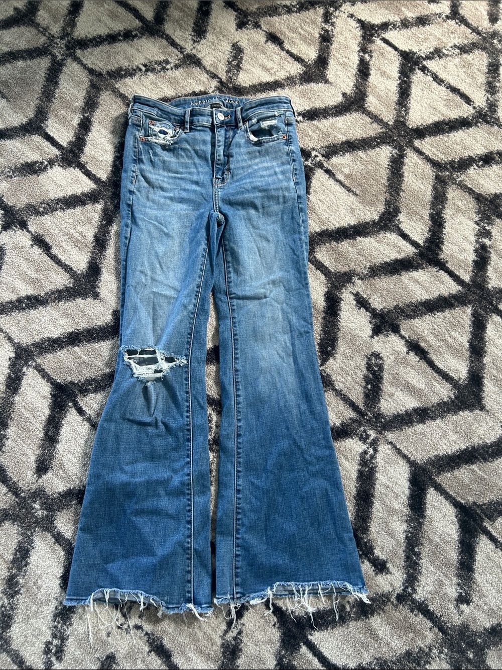 American Eagle Outfitters Distressed Flare Jeans - Medium Blue